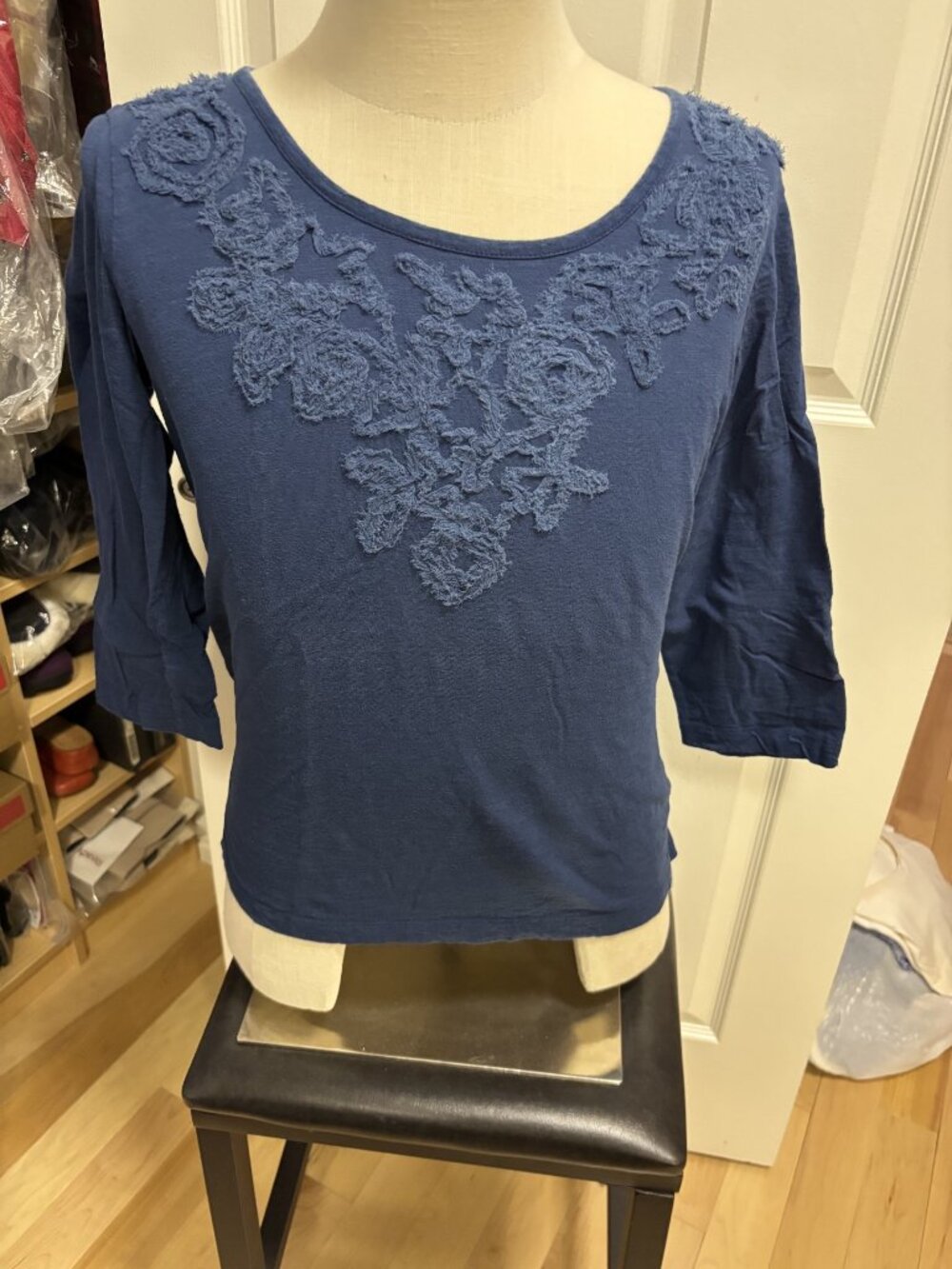 Embroidered neckline, 3/4 sleeve rounded neck top